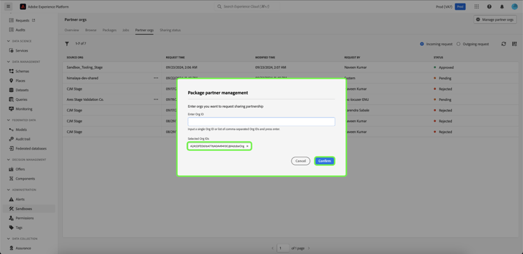 La boîte de dialogue des organisations partenaires de package avec Entrer l’ID d’organisation, les ID d’organisation sélectionnés et Confirmer mise en surbrillance.